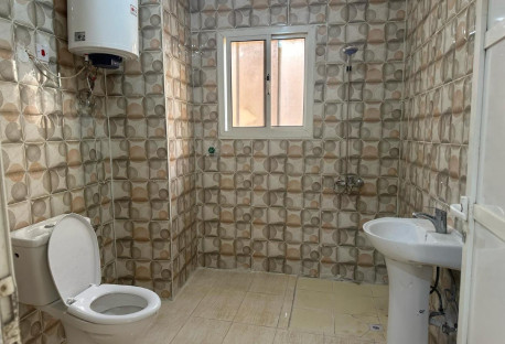 Al-Kharitiyat Bent House Room with kitchen family