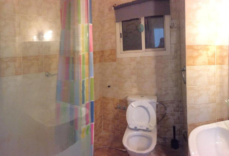 Al-Kharaitiyat room with kitchen and bathroom