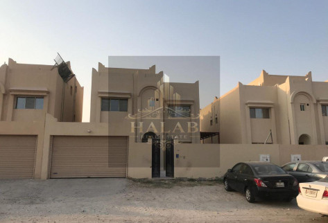 A penthouse room with a AL khrityat