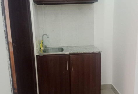 Al Kharaitiyat room with kitchen and bathroom