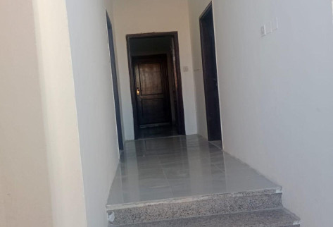 Al Kharaitiyat room with kitchen and bathroom