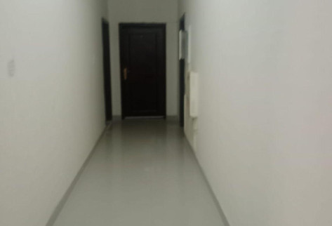 Al Kharaitiyat room with kitchen and bathroom