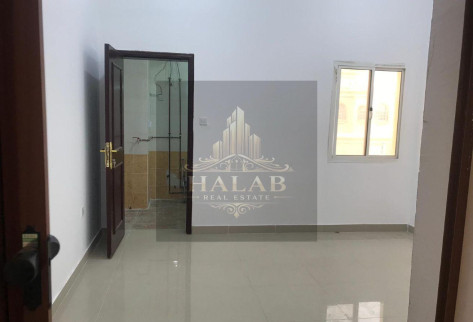 A penthouse room with a AL khrityat