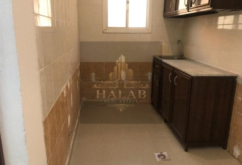 A penthouse room with a AL khrityat
