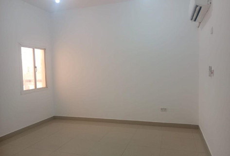 Al Kharaitiyat room with kitchen and bathroom