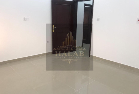 A penthouse room with a AL khrityat