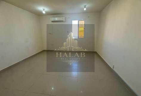 A penthouse room with a AL khrityat