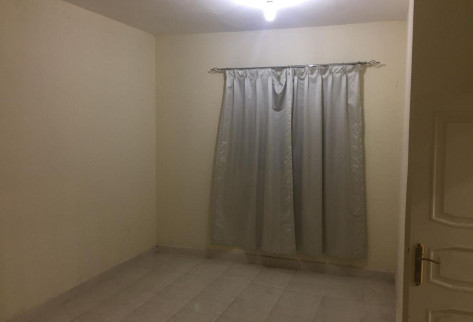 Al-Kharaitiyat room with kitchen and bathroom