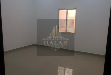 A penthouse room with a AL khrityat