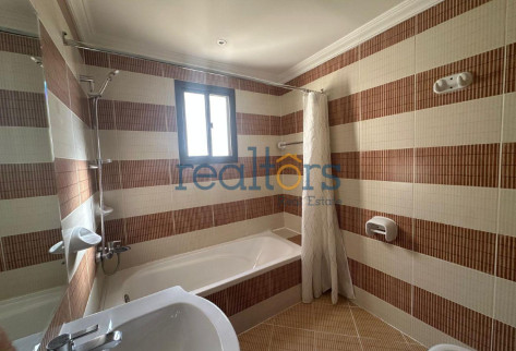 Rustic charm, cozy 1BR with balcony in a Compound