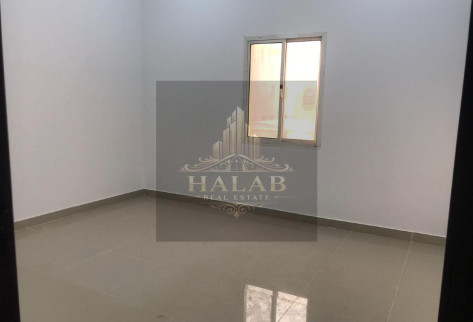 A penthouse room with a AL khrityat