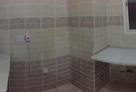 Al-Kharaitiyat room with kitchen and bathroom