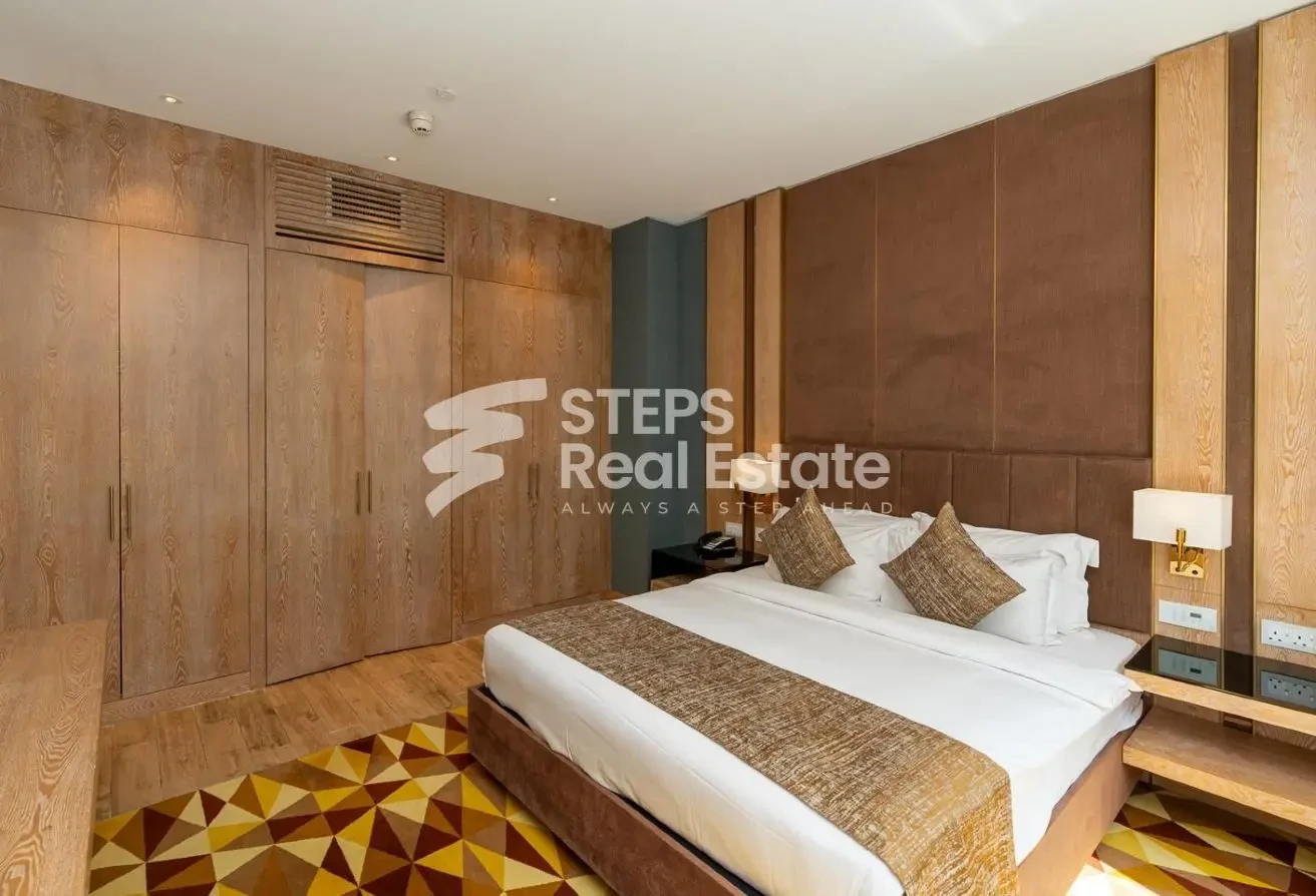 Spacious 2 Bedroom Hotel Apartment in West Bay - Apartment in The Bentley Luxury Hotel & Suites
