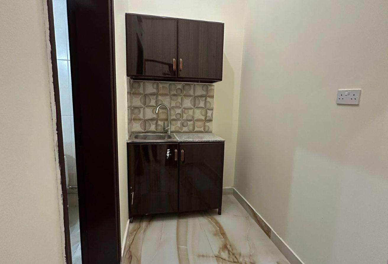 Al Kharaitiyat room and lounge - Apartment in Al Kharaitiyat