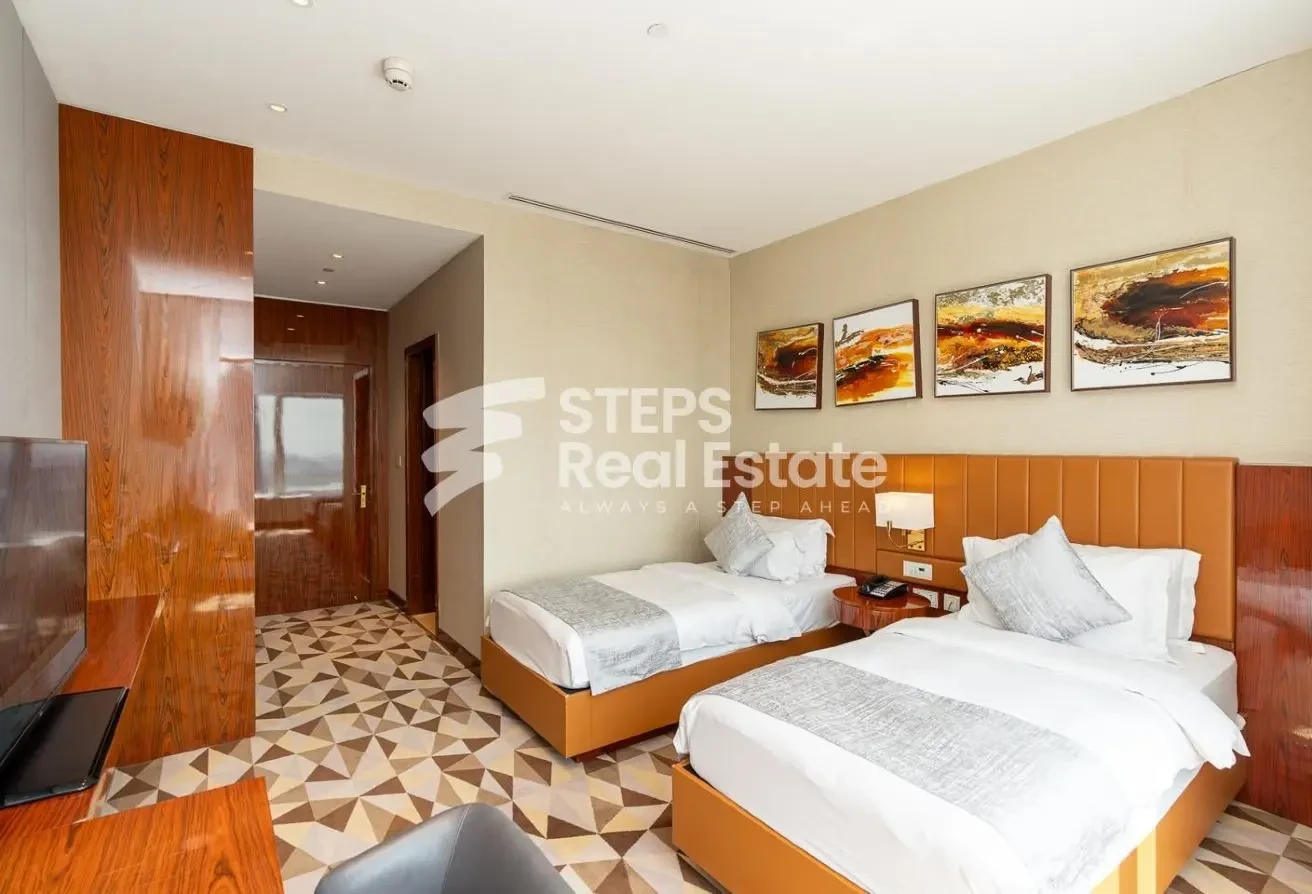 Spacious 2 Bedroom Hotel Apartment in West Bay - Apartment in The Bentley Luxury Hotel & Suites