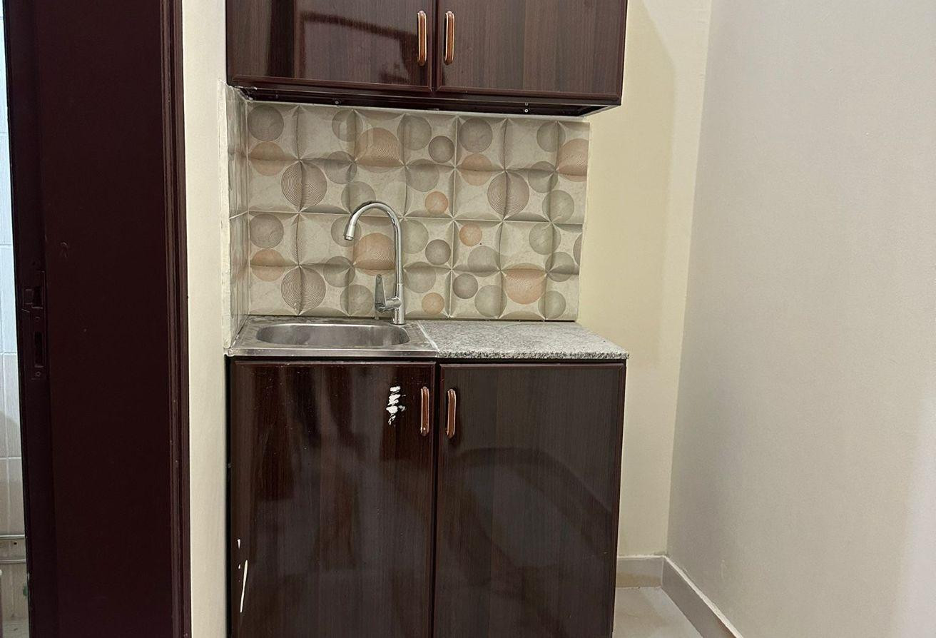 Al Kharaitiyat room and lounge - Apartment in Al Kharaitiyat