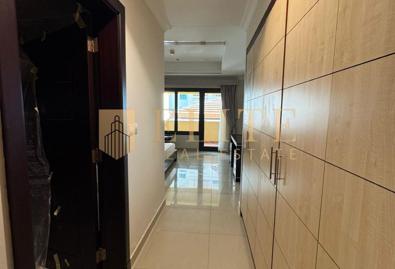 Spacious 2BR with Balcony in Porto Arabia - Apartment in Viva East