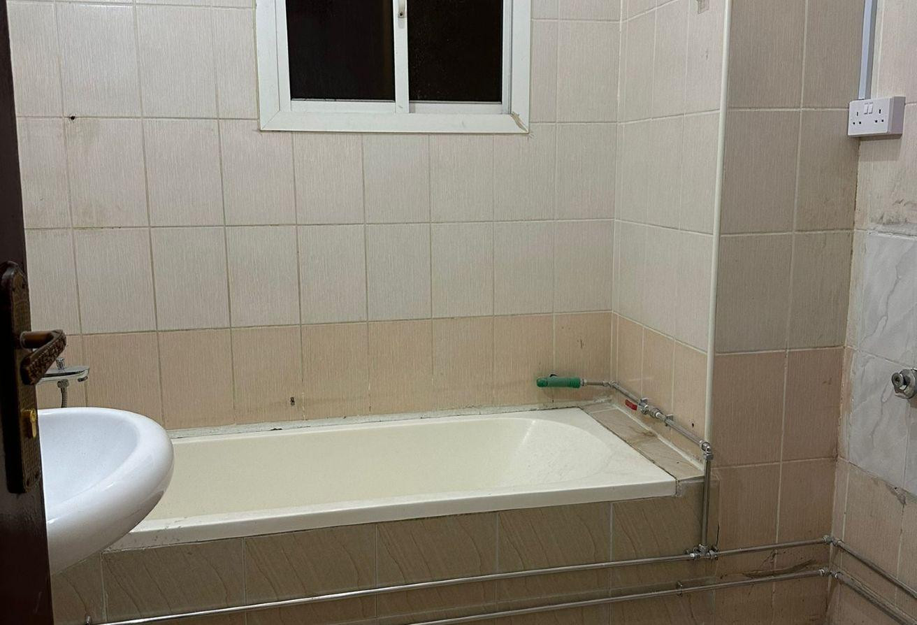 Al Kharaitiyat room and lounge - Apartment in Al Kharaitiyat